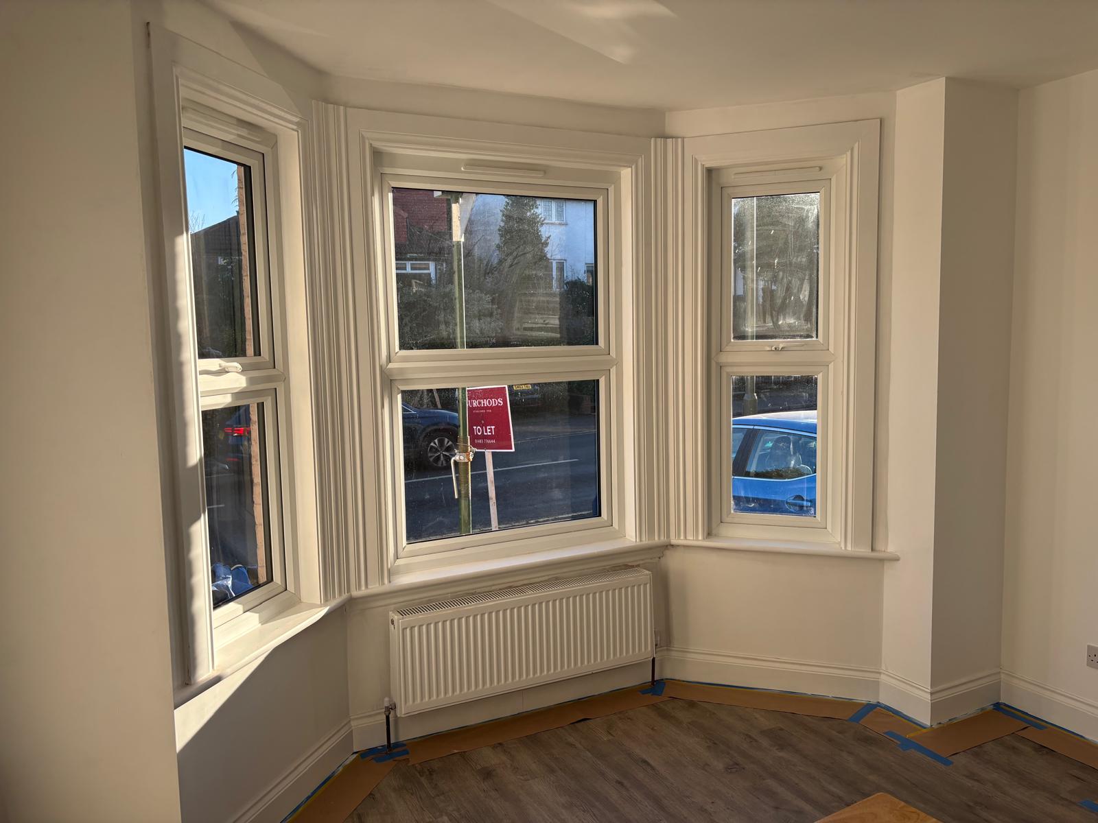 Bay window with three sash windows, seen from inside